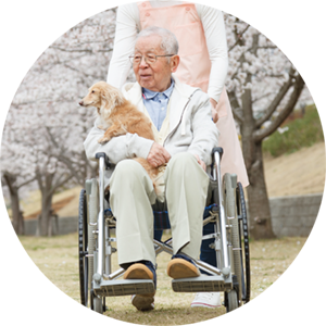 A caregiver and a senior walking together